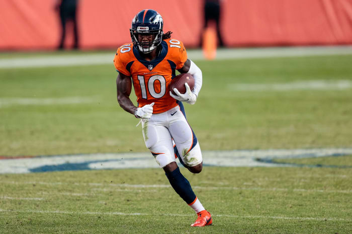 Denver Broncos wide receiver Jerry Jeudy (10) runs the ball on a reception in the fourth quarter against the Denver Broncos at Empower Field at Mile High.